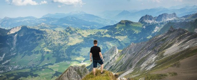 a.pic.man in shorts looking at mtn